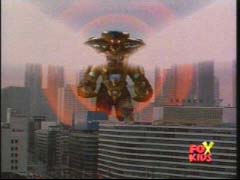 Red Ranger uses the Quantum Defender and Q-Rex to destroy Doomtron