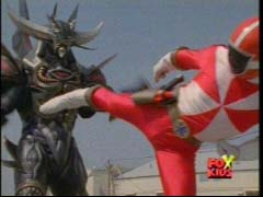 Red Ranger (Carter) battles Quarganon